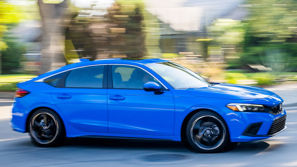 2022 Honda Civic Hatchback with accessory wheels driving
