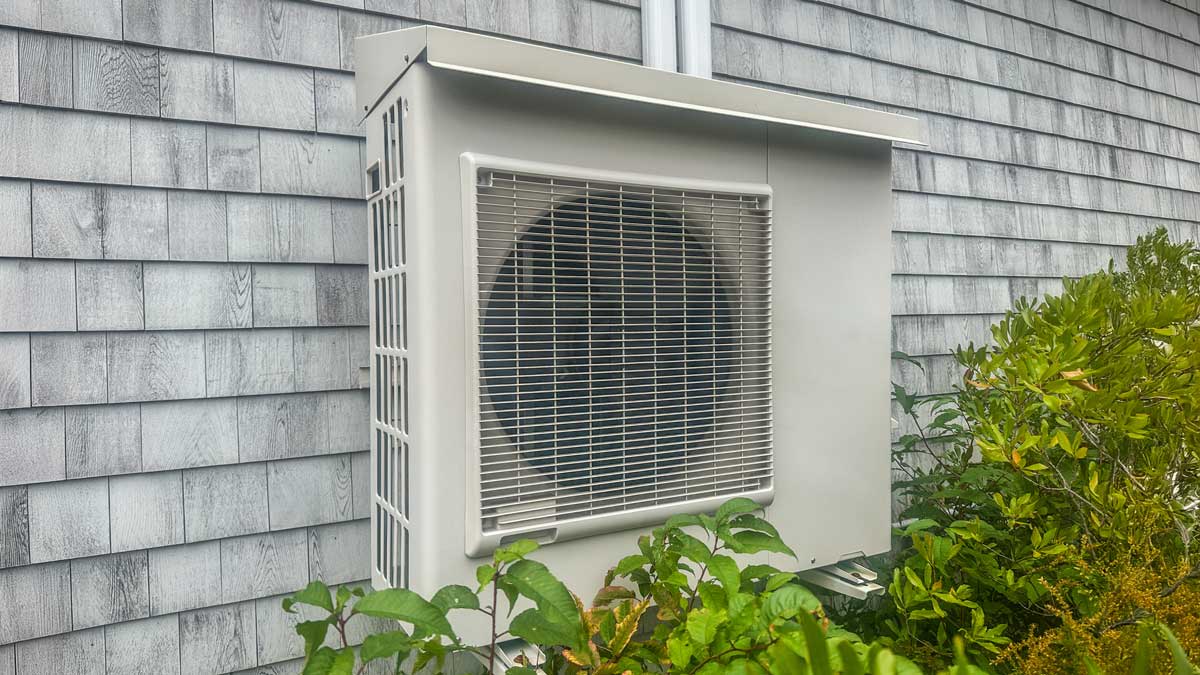 Heat pump next to house