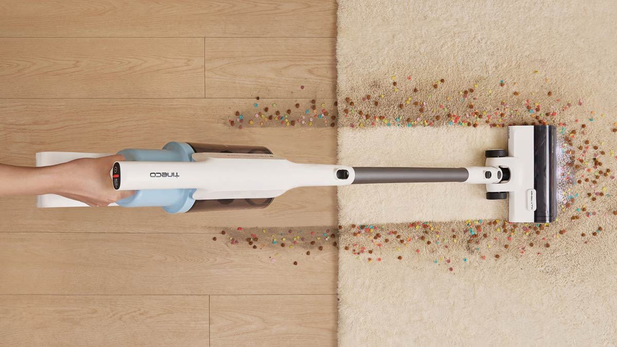 Tineco GO203 stick vaccum cleaning yo mess on wood floor and rug