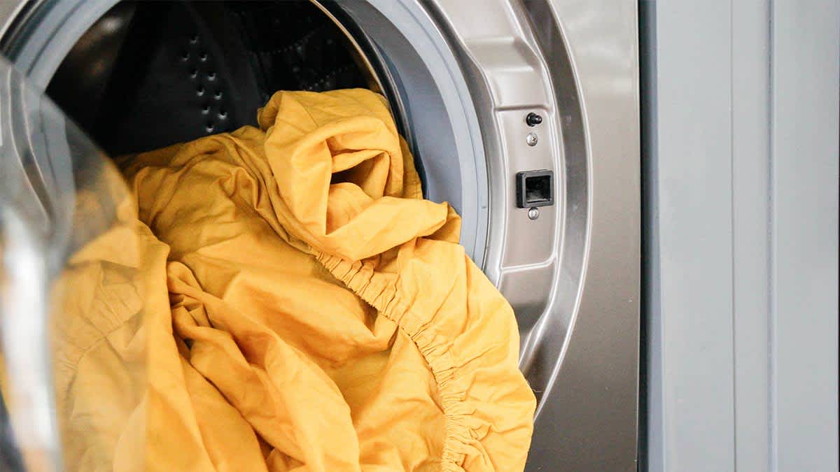 Bunched up sheet coming out of a front load washer.