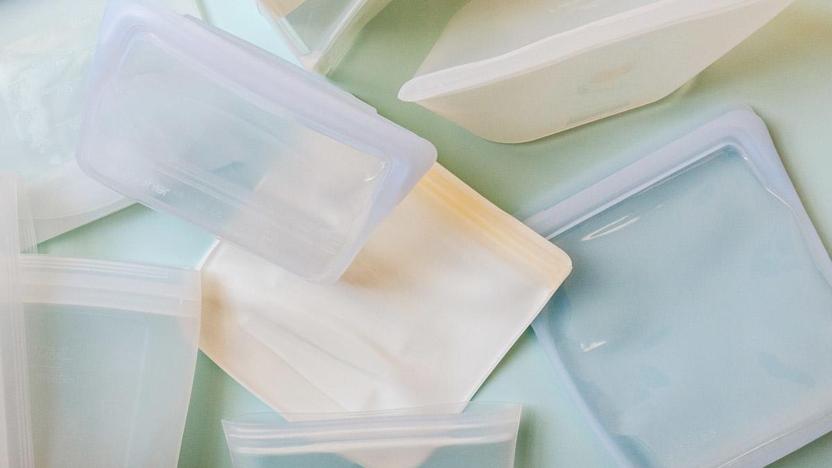 Silicone food storage bags on a blue background