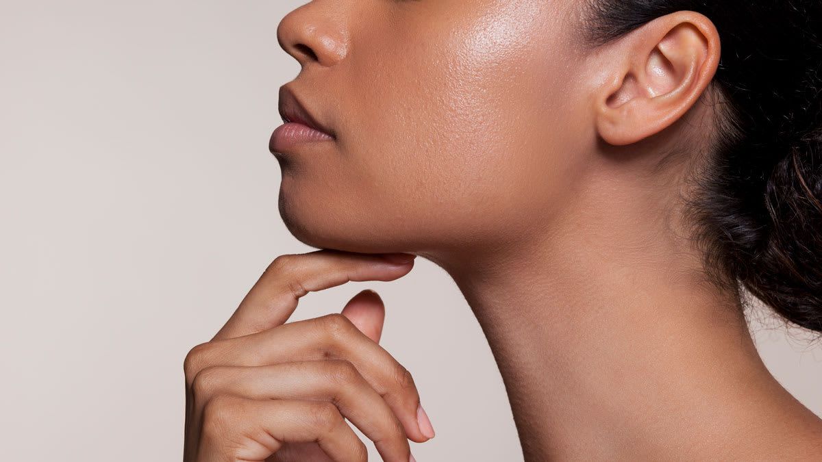 Woman touching her chin
