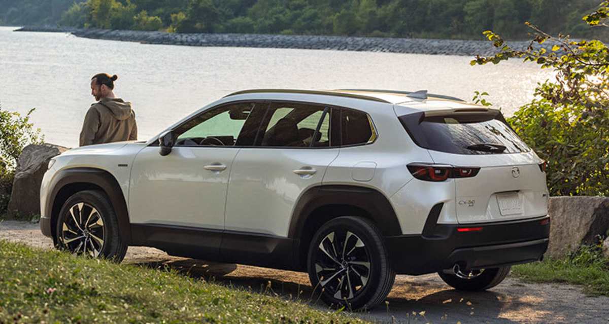2026 Mazda CX-50 Hybrid, rear, by water