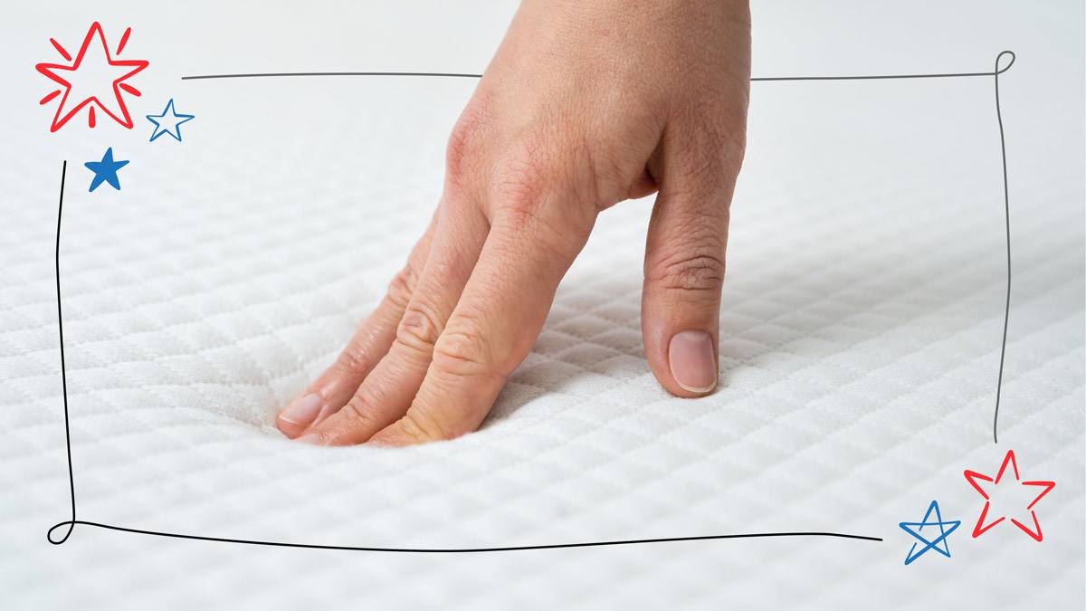 hand on mattress with line boarder and stars