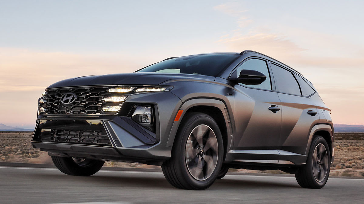 2025 Hyundai Tucson driving, front shown at wide angle