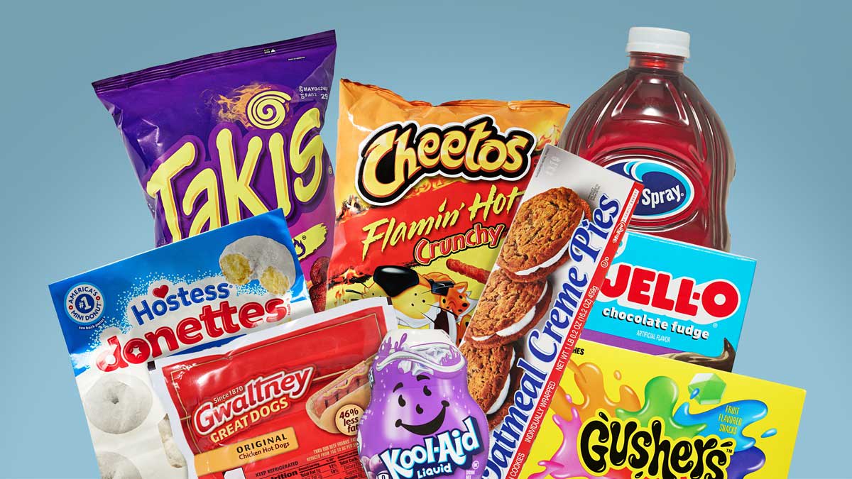 Takis chips, Flamin’ Hot Cheetos, Hostess Donettes, Gwaltney hot dogs, Oatmeal Creme Pies, Jell-O chocolate fudge pudding mix, Gushers fruit snacks, Kool-Aid liquid drink mix, grape, and Ocean Spray Diet Cran-Grape Juice