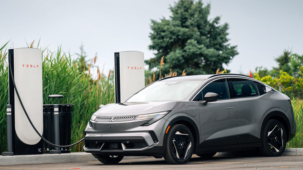 2027 Mitsubishi Eclipse Sportback using a Tesla Supercharger