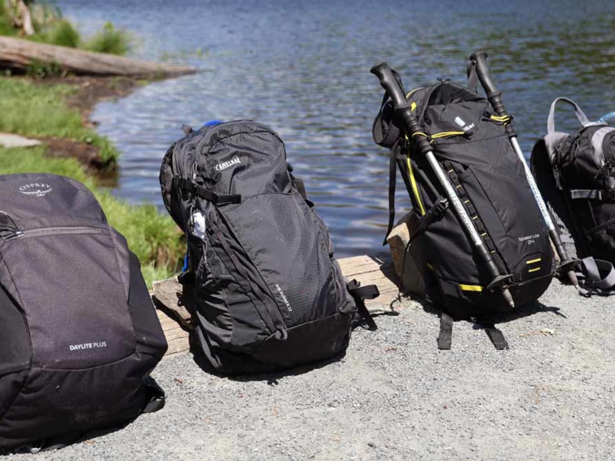 allintitle hiking backpack with hydration INOXTO 20 Pack Green this 16L capacity backpack includes a 2L water bladder and two 250ml water bottles Best Hydration Packs of 2026,