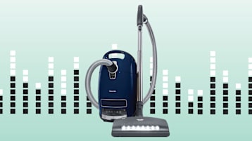 Miele Complete C3 Marin canister vacuum cleaner with sound wave graphic behind it