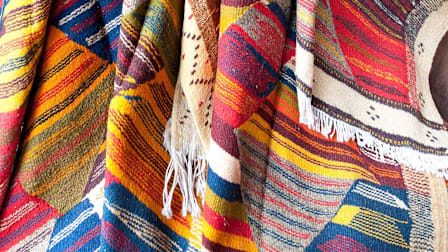 How to Care for Antique and Area Rugs
