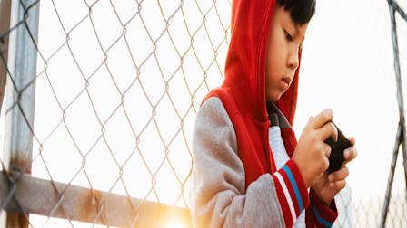 Kids Glued to Smartphones, Video Games Could Signal Addiction