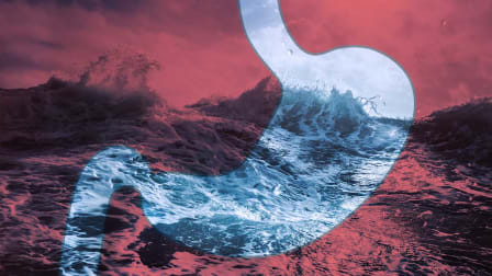 Photo illustration of an outline of a stomach with a stormy sea.