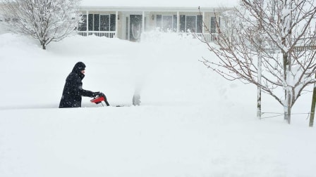 snow blower blowing snow