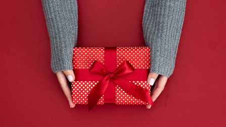 Hands holding a gift