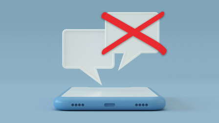 An Illustration of a cell phone with two messages coming out of it. One of the messages has a red X over it.