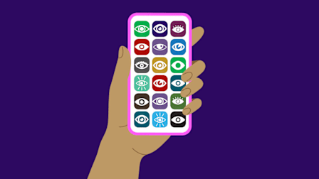 Hand holding phone with apps with different eye icons on them