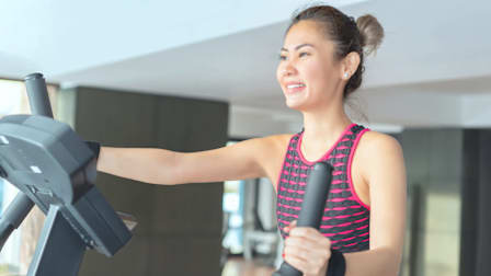 Women using elliptical