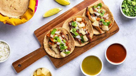 Traditional Mexican street food called "Tacos al pastor"