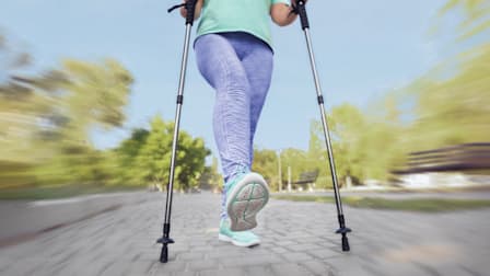 A person using walking sticks.