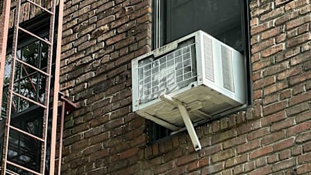 A window AC seen from outside.