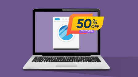 A laptop showing a washing machine on its screen with a large discount