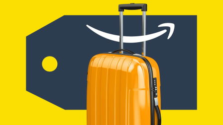 Luggage with a large sales tag and an Amazon smile logo