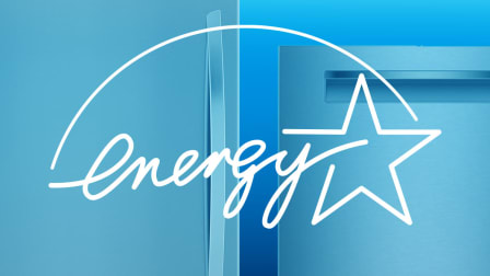 An Energy Star-rated refrigerator and dishwater seen with the Energy Star logo.