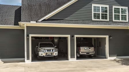 SUV cars parked in an attached home garage
