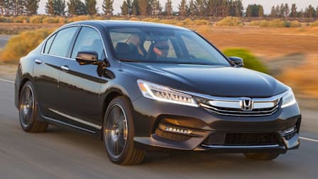a 2017 Honda Accord driving on a road