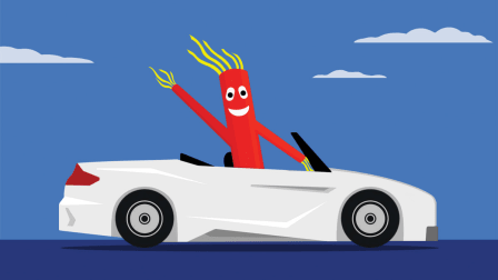 an air dancer driving a convertible car