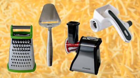 four cheese graters on a shredded cheese background