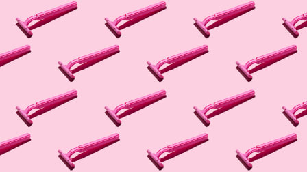 pink razors on a pink background