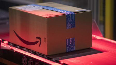 Packed boxes pass along a conveyor belt at the Amazon.com fulfilment centr