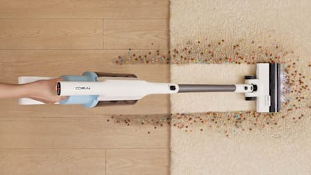 Tineco GO203 stick vaccum cleaning yo mess on wood floor and rug