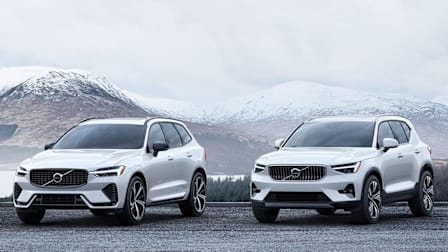 2024 Volvo XC60 and XC40 in front of snow-capped mountains