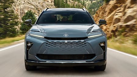 2026 Toyota Crown Signia driving on a canyon road, straight shot