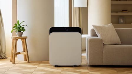 Blueair air purifier in room with couch