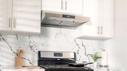 Hauslane 30" Under Cabinet Range Hood UC-PS18SS-30 in a kitchen.
