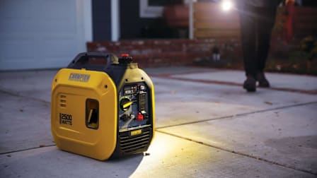 Champion 201317 Inverter Generator on a residential driveway.
