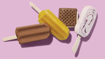 Four frozen treats on pink background