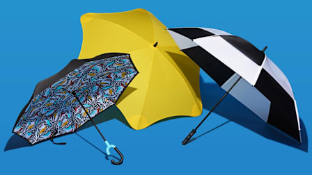 Shed Rain Reverse closing stick umbrella, Blunt Exec umbrella and GustBuster The Pro Series Gold umbrella