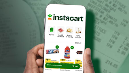 Hands on phone with Instacart app open