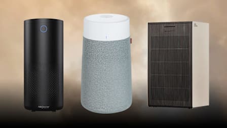 Airdoctor 4000 Black, Blueair Blue Pure 311i+ Max, and Coway Airmega ProX air purifiers with smoke in background