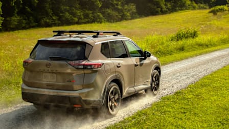 2026 Nissan Rogue Rock Creek edition driving on dirt road