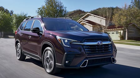 2026 Subaru Ascent driving through a neighborhood