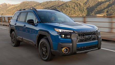 2026 Subaru Outback Wilderness driving over a bridge