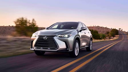 2026 Lexus NX Hybrid driving on a road in the Southwest.