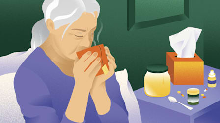 An illustration of an older woman in bed drinking from a cup of tea with tissues, honey and pills on her bedside table.