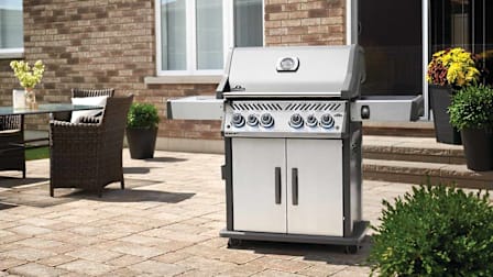 Napoleon Rogue RSE525RSIBPSS-1 gas grill seen on a patio.
