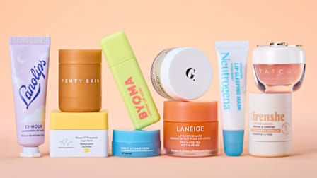 grid with Laneige Lip Sleeping Mask, Tatcha The Kissu Lip Mask, Fenty Plush Puddin' Intensive Recovery Lip Mask, goop Beauty	nourishing lip repair mask, Drunk Elephant	Plump-C Tripeptide Lippe Mask, Lanolips	12 Hour Overnight Lip Mask, e.l.f. Holy Hydration! Lip Mask, Being Frenshe Lip Mask, Byoma	Liptide Lip Mask, and Neutrogena Hydro Boost Hydrating Lip Sleeping Mask on light orange background